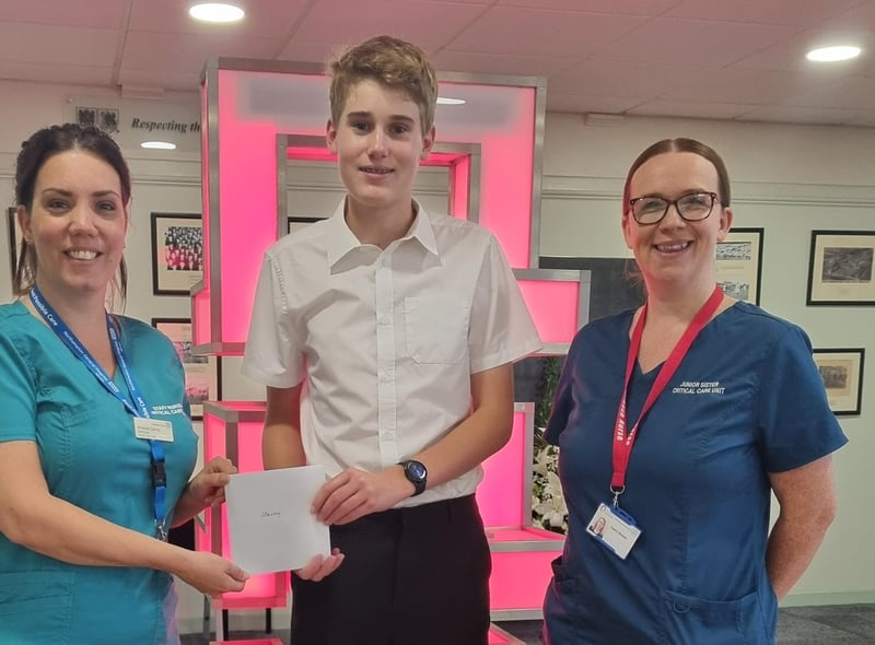 Young artist with Northampton General Hospital staff