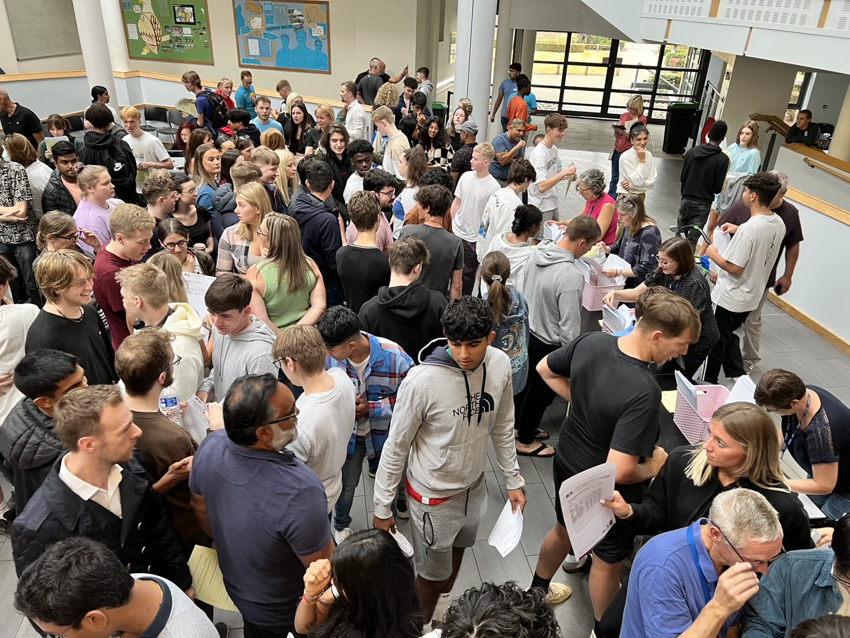 Crowd of students collecting their A Level results at Northampton School for Boys in August 2022